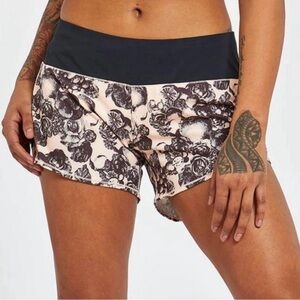 Oiselle Roga shorts. Rose botanical print. Size 8. 4” inseam EUC title nine